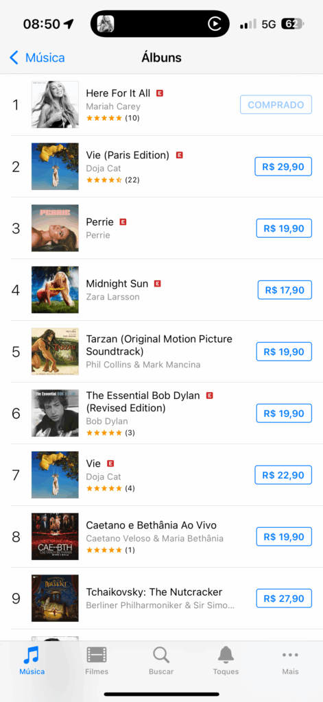 Imagem mostrando o top 10 de álbuns no iTunes, com Here For It All na posição #1